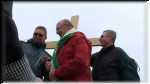 Bishop Julian on the summit - flanked by Fr Przemyslaw Karasiuk and  the artist Grzegorz Dbrowa.