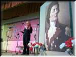 One of the winners of the poetry & music competition Bunty Bisharah reading her poem in the  Memorial Hall, Jindabyne.