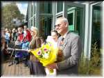 NPWS representatives have embraced the idea of Kosciuszko Festivals even before the historic concert on Mt Kosciuszko. Dave Darlington receving flowers from Festival organizers.