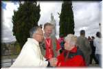 Krystyna Cyro (right) saying good bye to Fr Joe.