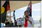NAIDOC celebrations: Ngarigo Corroboree in the Snowies.  Aunty Deannah Davison with a historic photo of her grandfather.