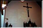 And one could see a photo of Stan Blum projected on the wall above the altar.